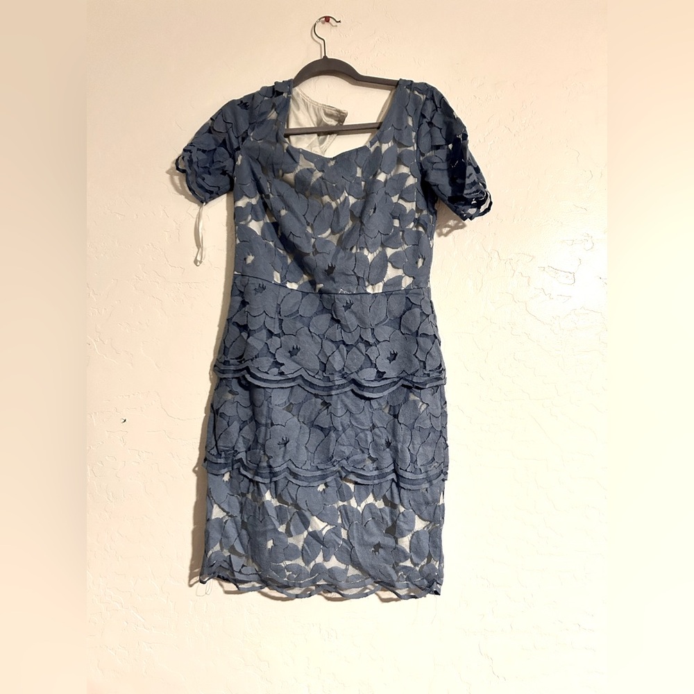 Antonio Melanie 
Size 8 
Midi light blue dress